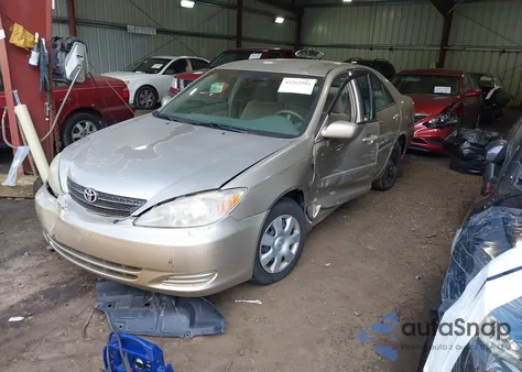 2002 Toyota Camry Le from USA, damaged, VIN 4T1BE32K82U559233